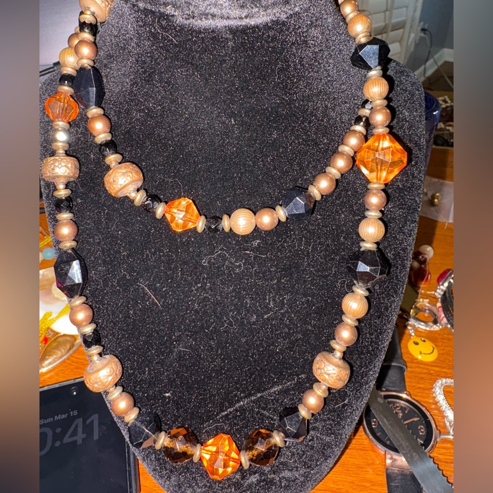 vintage double-strand necklace featuring a combination of amber-colored